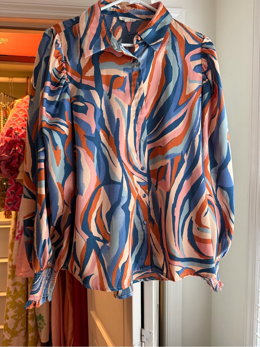 Abstract Swirl Button-Up Blouse in Blue, Pink & Orange with smocked cuffs.